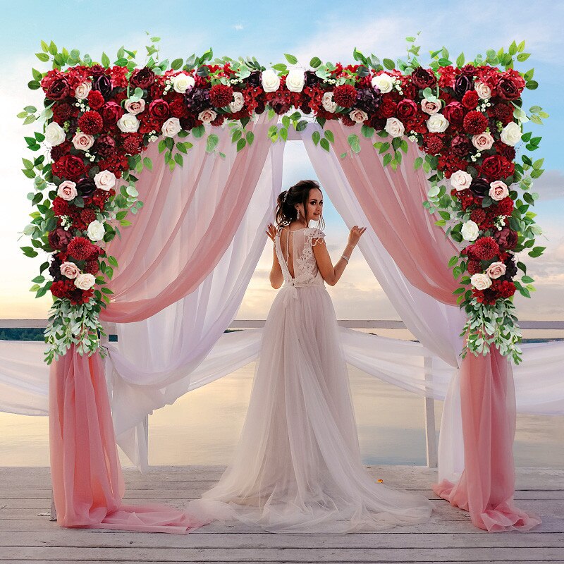 flower arrangement inside of vintage bird cage