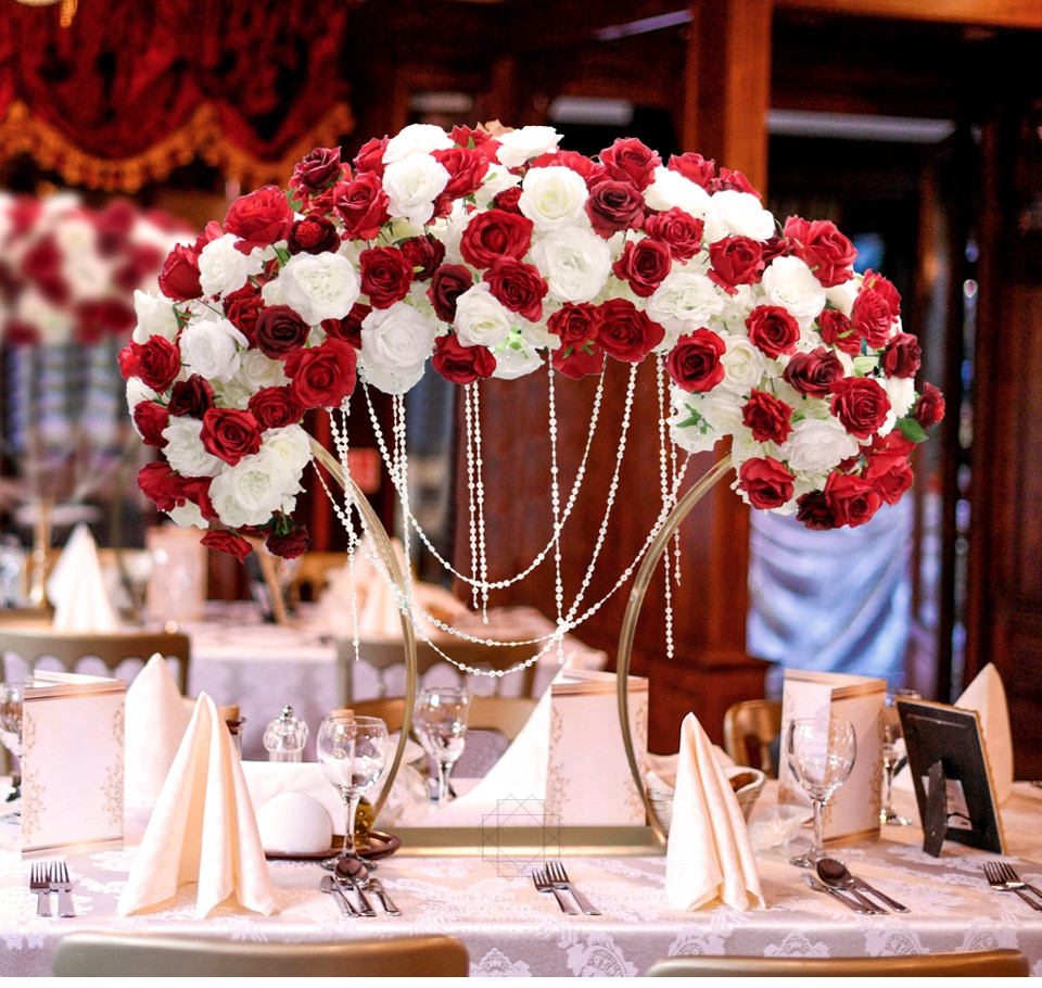 red artificial flower in vase