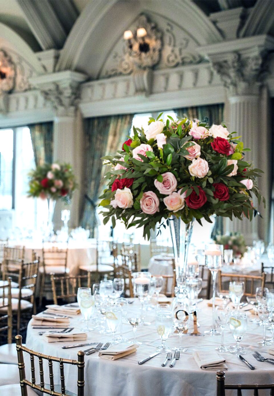 flower arrangements in a vintage watering can