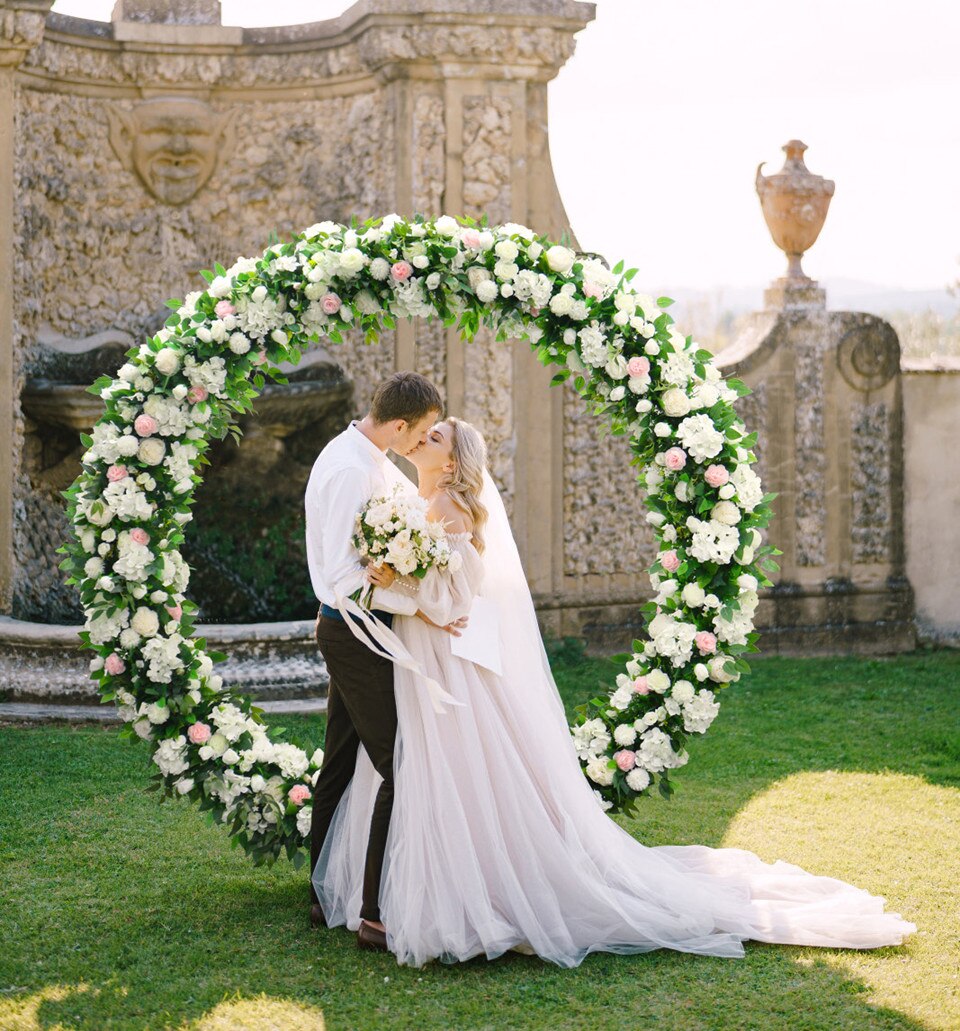 white wicker flower stands